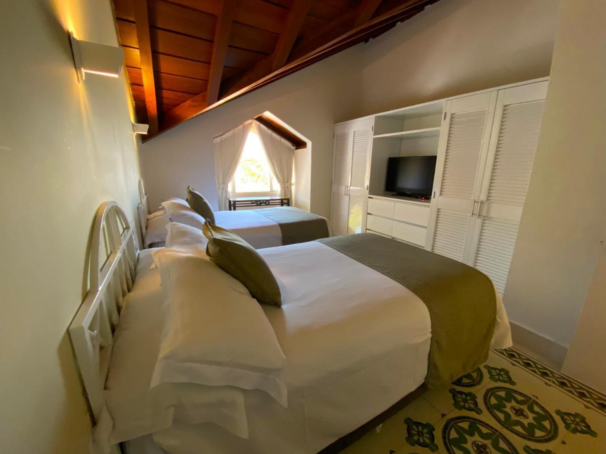 Hotel Las Americas Casa De Playa Cartagena Екстериор снимка A room at the hotel