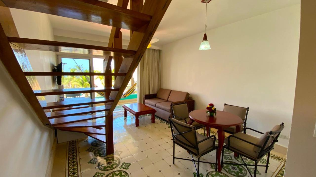 Hotel Las Americas Casa De Playa Cartagena Екстериор снимка A living room in a typical apartment at the resort