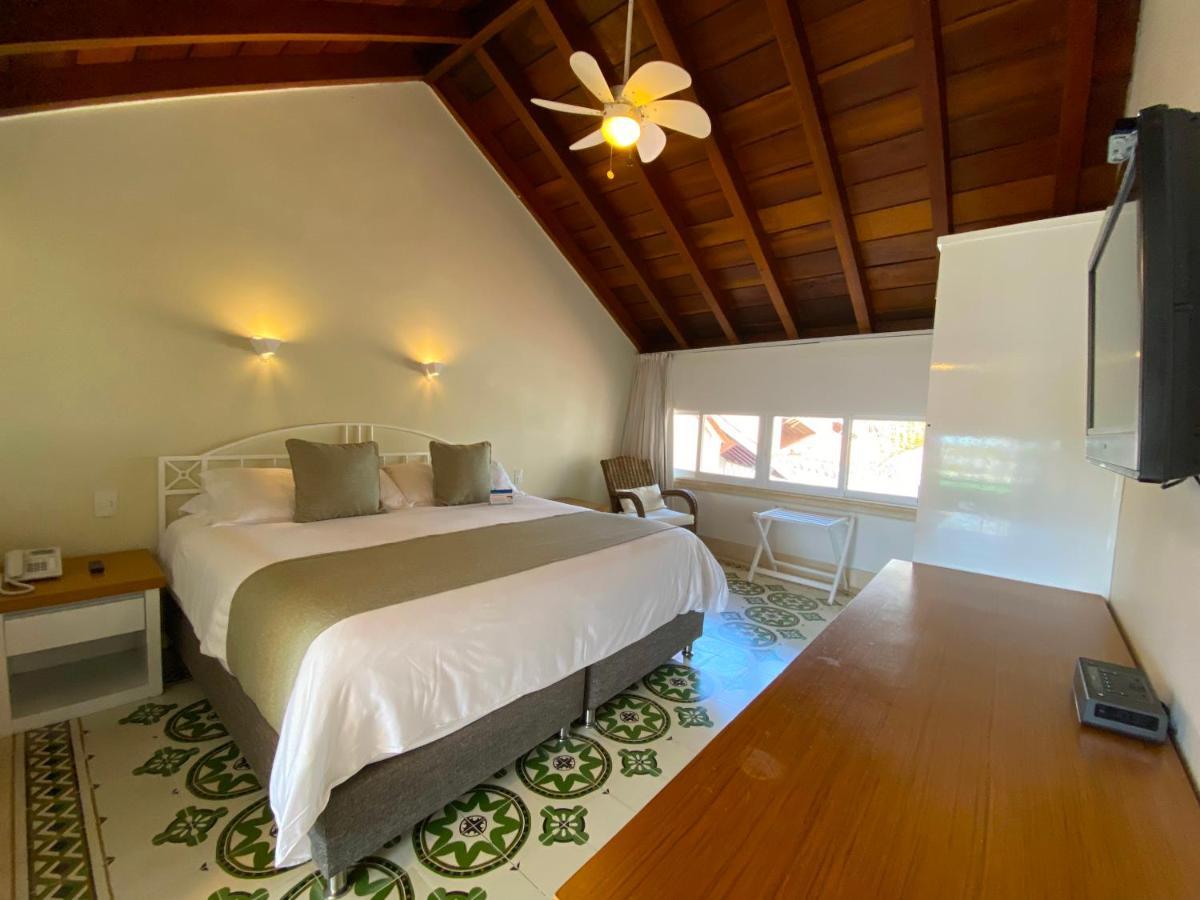 Hotel Las Americas Casa De Playa Cartagena Екстериор снимка A room at the hotel